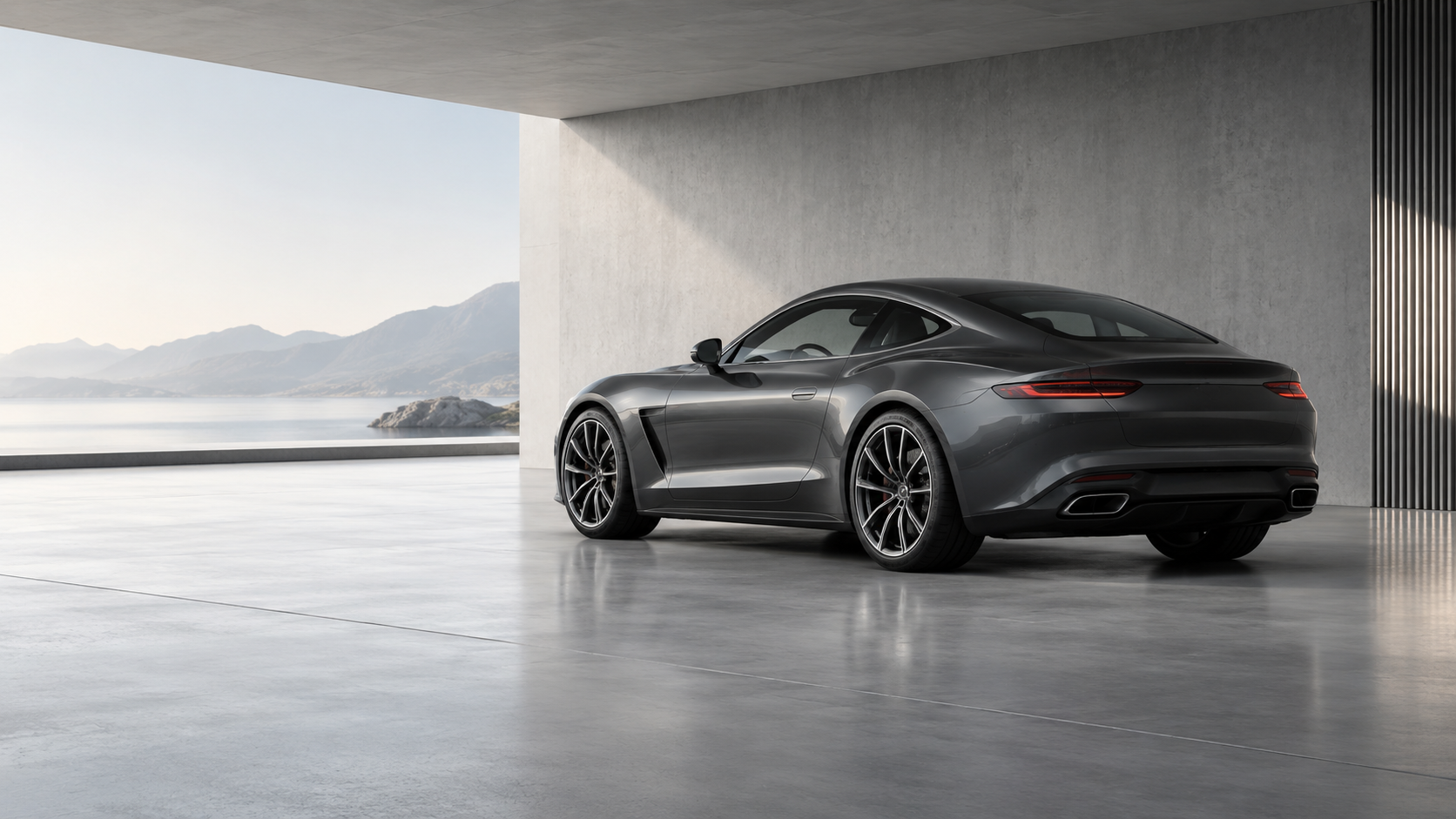Graphite performance coupe in a light architectural garage